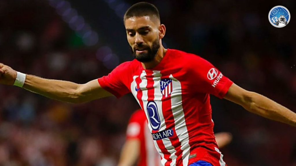 Carrasco con la camiseta del Atletico